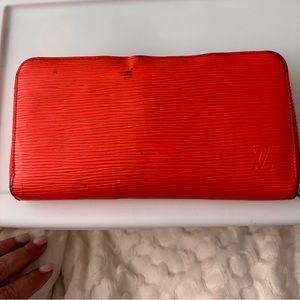 Louis Vuitton Zippy wallet.